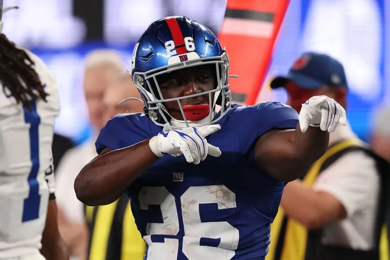 Devin Singletary #26 of the New York Giants reacts after a first down during the fourth quarter against the Dallas Cowboys at MetLife Stadium on September 13, 2026 in East Rutherford, New Jersey.