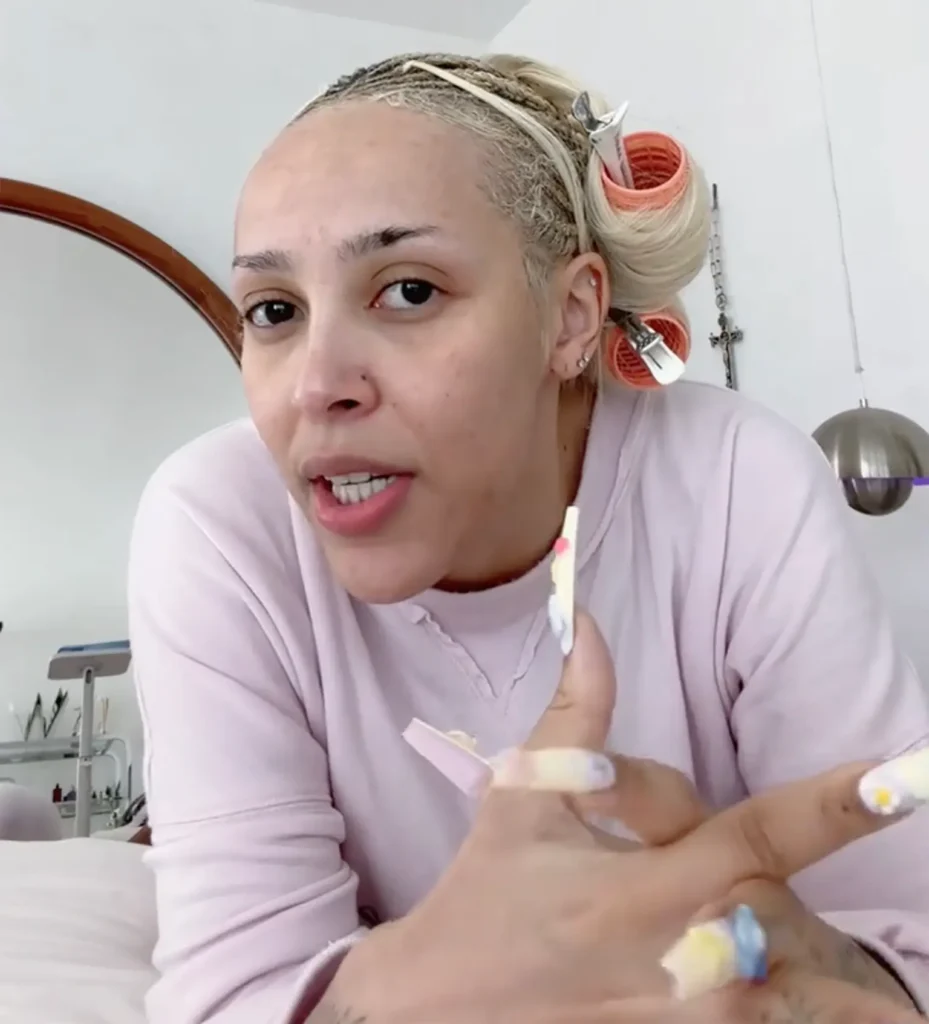Doja Cat Opens Up About Past Cocaine and Alcohol Struggles 5 Doja Cat (seen above in a TikTok video)