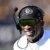 Head coach Deion Sanders of the Colorado Buffaloes looks on before the game against the West Virginia Mountaineers at Milan Puskar Stadium on November 08, 2025 in Morgantown, West Virginia.