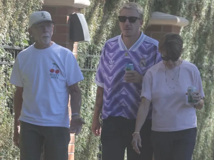 Macklemore Steps Out in Real Madrid Jersey After Tour Exit 4 Macklemore Spotted On A Walk in Seattle After Ed Sheeran Tour Exit