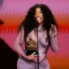 SZA accepts the Best R B Song award for Snooze onstage during the 66th GRAMMY Awards at Crypto.com Arena on February 04, 2024 in Los Angeles, California.