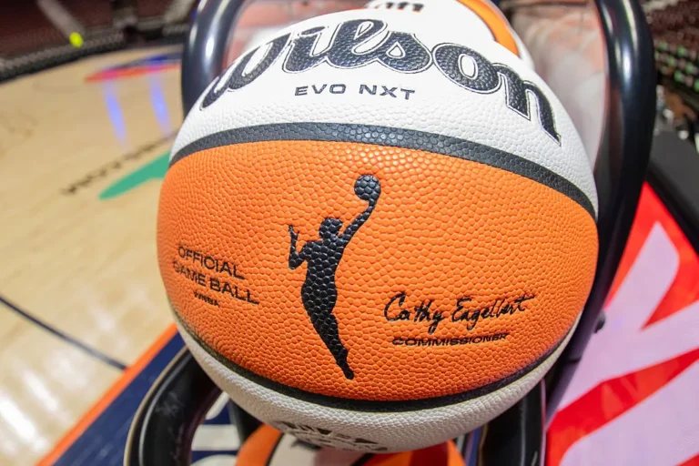 A detail view of the WNBA logo on a WNBA official game ball on a rack before a WNBA game between the Atlanta Dream and the Connecticut Sun on September 10, 2025, at Mohegan Sun Arena in Uncasville, CT.