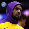 Bronny James of the Los Angeles Lakers looks on during the third quarter against the Detroit Pistons at Little Caesars Arena on November 04, 2024 in Detroit, Michigan.