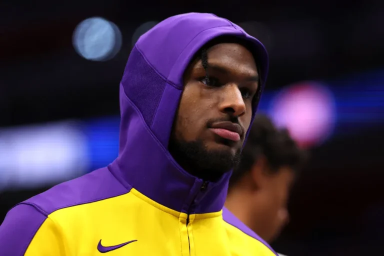 Bronny James of the Los Angeles Lakers looks on during the third quarter against the Detroit Pistons at Little Caesars Arena on November 04, 2024 in Detroit, Michigan.