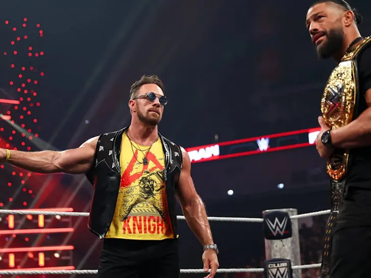 LA Knight Roman Reigns