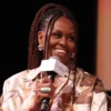 Michelle Obama speaks during Higher Grounds IMO with Michelle Obama Craig Robinson podcast during 2025